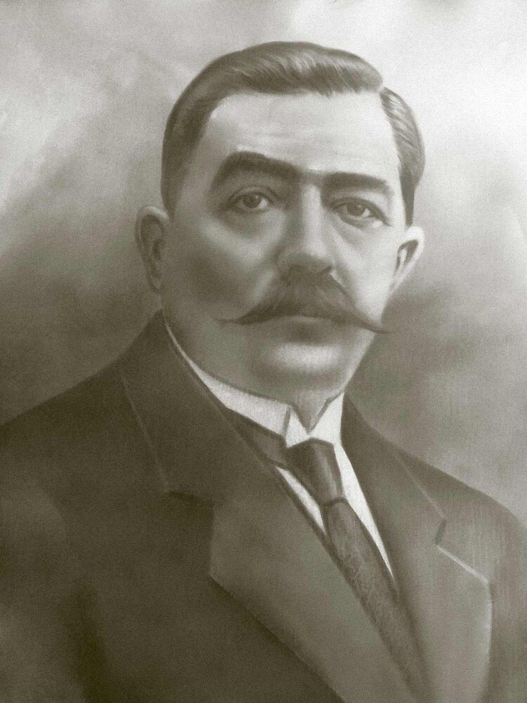 Αρχειακό πορτρέτο του Νικολάου Δ. Καρδασιλάρη: άνδρας με σκούρο κοστούμι, γραβάτα και πυκνό μουστάκι.